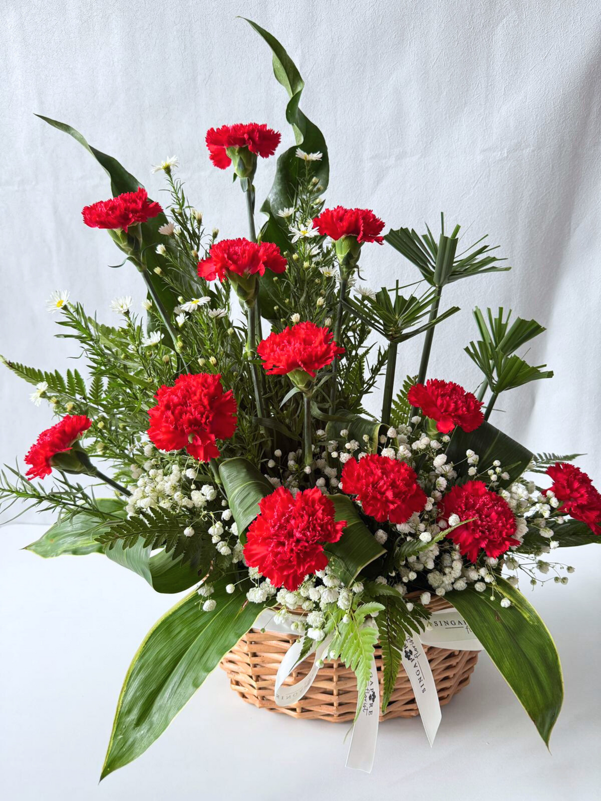 Cheerful Caldecott Carnations Flowers Table Arrangement