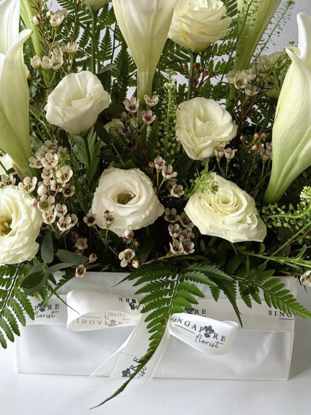 Laudable Labrador Lilies Table Arrangement