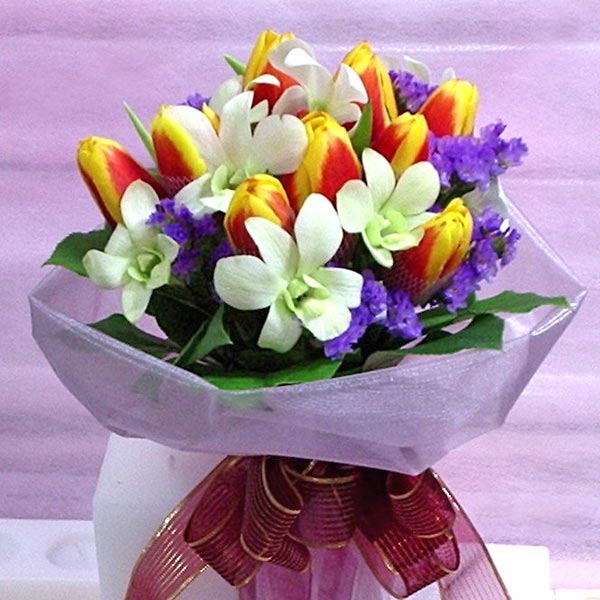 2 Tone Yellow-Red Tulips mixed with White Orchids Handbouquet