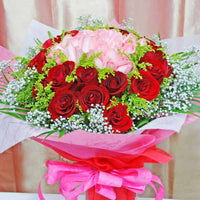 50 Roses (25 Red 25 Peach at center) Handbouquet